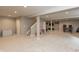 Spacious basement with recessed lighting, carpet flooring, and ample space for recreation and storage at 1559 Redsunset Dr, Brownsburg, IN 46112