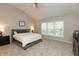 Comfortable main bedroom featuring a high ceiling, a ceiling fan, and natural light at 1559 Redsunset Dr, Brownsburg, IN 46112