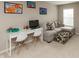 Cozy study area featuring a comfortable couch, a work space, and creative decor at 1559 Redsunset Dr, Brownsburg, IN 46112