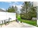 Backyard with a paved patio and green lawn surrounded by a privacy fence at 16311 Sunland Ct, Westfield, IN 46074