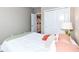 Bedroom features a cozy bed, sliding closet doors, and neutral decor at 16311 Sunland Ct, Westfield, IN 46074