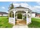 Community gazebo offers a shady retreat with seating and landscaping at 16311 Sunland Ct, Westfield, IN 46074