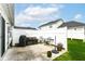 Back patio featuring an outdoor dining set, grill, and privacy fence at 16311 Sunland Ct, Westfield, IN 46074