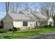 Inviting home with a well-kept lawn, charming details, and a functional mailbox at 1920 Mystic Bay Ct, Indianapolis, IN 46240