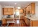 Spacious kitchen with wooden cabinets, stainless steel appliances and lots of counter space at 1920 Mystic Bay Ct, Indianapolis, IN 46240