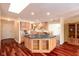 Well-designed kitchen featuring an island, ample cabinetry, and modern lighting fixtures at 1920 Mystic Bay Ct, Indianapolis, IN 46240