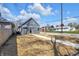 New home with gray siding, a sidewalk, and a freshly seeded front yard ready for grass at 2041 N Dexter St, Indianapolis, IN 46202