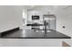 Bright kitchen featuring stainless appliances, granite counters, white cabinets, and modern faucet at 2041 N Dexter St, Indianapolis, IN 46202