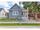 Charming home featuring a well-kept lawn, classic architecture, and inviting front porch at 211 N Merrill St, Fortville, IN 46040