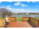 Beautiful backyard deck overlooking a tranquil lake, perfect for relaxation and outdoor living at 2307 Cedarmill Dr, Franklin, IN 46131