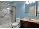 Bathroom featuring a glass enclosed shower, toilet, vanity with solid surface, and towel rack at 2307 Cedarmill Dr, Franklin, IN 46131