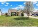 Inviting home with well-kept lawn and landscaping, highlighting curb appeal and neighborhood charm at 2307 Cedarmill Dr, Franklin, IN 46131