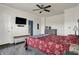 Comfortable bedroom with a large bed, bedside table, lamp, and modern furnishings at 2307 Cedarmill Dr, Franklin, IN 46131