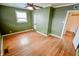 Cozy bedroom offering hardwood floors, and access to an adjacent bathroom at 2317 St Peter St, Indianapolis, IN 46203
