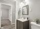 Well-lit bathroom featuring a sleek vanity, mirror, and updated fixtures at 2336 St Paul St, Indianapolis, IN 46203