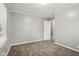 This bedroom features neutral paint colors, carpet flooring, and a large closet at 2336 St Paul St, Indianapolis, IN 46203