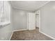 Cozy bedroom with neutral paint colors and newer neutral carpet at 2336 St Paul St, Indianapolis, IN 46203