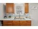 Traditional kitchen cabinets paired with marble-look countertops and stainless faucet at 2336 St Paul St, Indianapolis, IN 46203