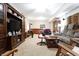 The finished basement features a comfortable seating area, ample lighting, and entertainment at 2889 Grimes Way, Columbus, IN 47201