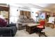 Basement living area featuring a comfortable couch and well-lit atmosphere for relaxation at 2889 Grimes Way, Columbus, IN 47201
