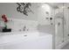 Stylish bathroom featuring a modern tub, walk-in shower, and elegant marble accents at 2889 Grimes Way, Columbus, IN 47201