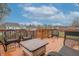 Cozy outdoor deck features charming wicker furniture, perfect for relaxing and entertaining with a beautiful view at 2889 Grimes Way, Columbus, IN 47201