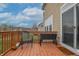 Deck with outdoor seating and planter box, complete with a sliding glass door for easy access at 2889 Grimes Way, Columbus, IN 47201