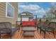 Wood deck featuring a fire pit and seating arrangement, with outdoor views of the backyard at 2889 Grimes Way, Columbus, IN 47201