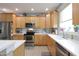 Spacious kitchen featuring stainless steel appliances and generous counter space at 2889 Grimes Way, Columbus, IN 47201