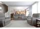 Spacious living room with an open layout and plush seating, ideal for entertaining and relaxation at 2889 Grimes Way, Columbus, IN 47201