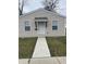Charming single story home with neutral siding, inviting front door, and walkway at 2968 N Gale St, Indianapolis, IN 46218