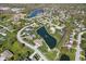 A neighborhood with a pond has mature trees and charming homes along the winding streets at 3256 Waterside Ct, Greenwood, IN 46143
