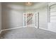 Bright office showcases open French doors and built in cabinetry at 3256 Waterside Ct, Greenwood, IN 46143