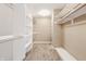 Spacious walk-in closet featuring custom shelving and ample storage for organizing your wardrobe at 3256 Waterside Ct, Greenwood, IN 46143