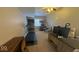 Finished basement with a treadmill, basketball hoop, and desk area at 3806 Sycamore Bend S Way, Columbus, IN 47203