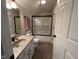Cozy bathroom featuring a shower-tub combo and a modern vanity at 3806 Sycamore Bend S Way, Columbus, IN 47203