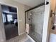 Modern bathroom featuring a glass-enclosed tiled shower at 3806 Sycamore Bend S Way, Columbus, IN 47203