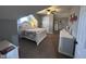 Inviting bedroom featuring a vaulted ceiling, a ceiling fan, and neutral decor at 3806 Sycamore Bend S Way, Columbus, IN 47203