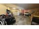 Spacious garage with storage and parked vehicles at 3806 Sycamore Bend S Way, Columbus, IN 47203