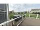 Outdoor hot tub on the back deck, set on a stone platform with a backyard view at 3806 Sycamore Bend S Way, Columbus, IN 47203