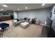 Large living room with an oversized sectional and a finished basement at 3806 Sycamore Bend S Way, Columbus, IN 47203