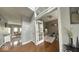 Open-concept living area with hardwood floors and decorative accents at 3806 Sycamore Bend S Way, Columbus, IN 47203
