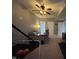 Recreation room with ceiling fan, multiple doorways and a desk at 3806 Sycamore Bend S Way, Columbus, IN 47203