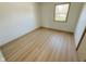 Bedroom featuring wood-look floors and a window at 439 Pleasantview Dr, Greenwood, IN 46142