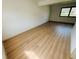 Serene bedroom with wood floors and a window allowing plenty of natural light at 439 Pleasantview Dr, Greenwood, IN 46142