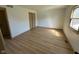 Bedroom featuring wood-look floors, window, and closet at 439 Pleasantview Dr, Greenwood, IN 46142