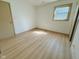 Bedroom featuring wood-look floors and a window at 439 Pleasantview Dr, Greenwood, IN 46142