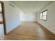 Bright living room featuring wood-look floors and a sunny window at 439 Pleasantview Dr, Greenwood, IN 46142