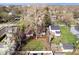 An aerial view highlights a home with a deck and well-maintained yard amidst a leafy, established neighborhood setting at 4711 Cornelius Ave, Indianapolis, IN 46208