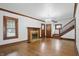 Living room features include: hardwood floors, a fireplace, and staircase to the second level at 4720 Central Ave, Indianapolis, IN 46205